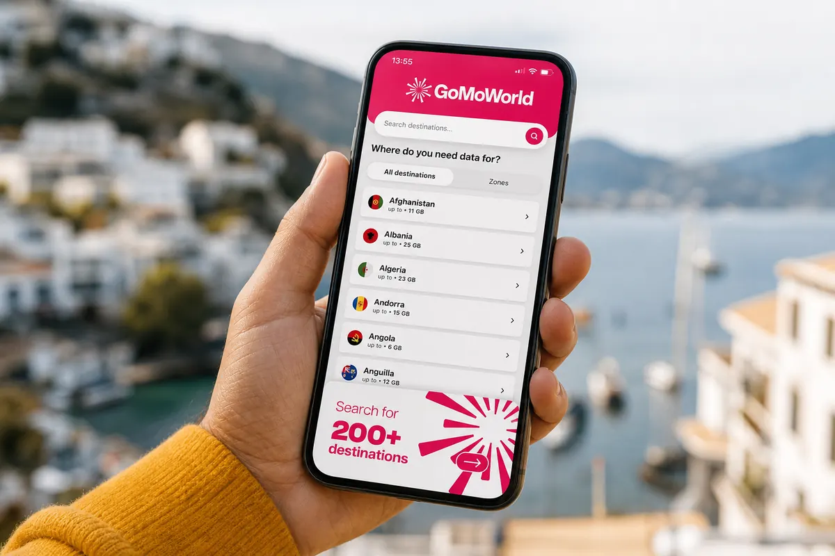 Two hands holding a smartphone, showing the network settings menu where the home line and GoMoWorld eSIM are both active